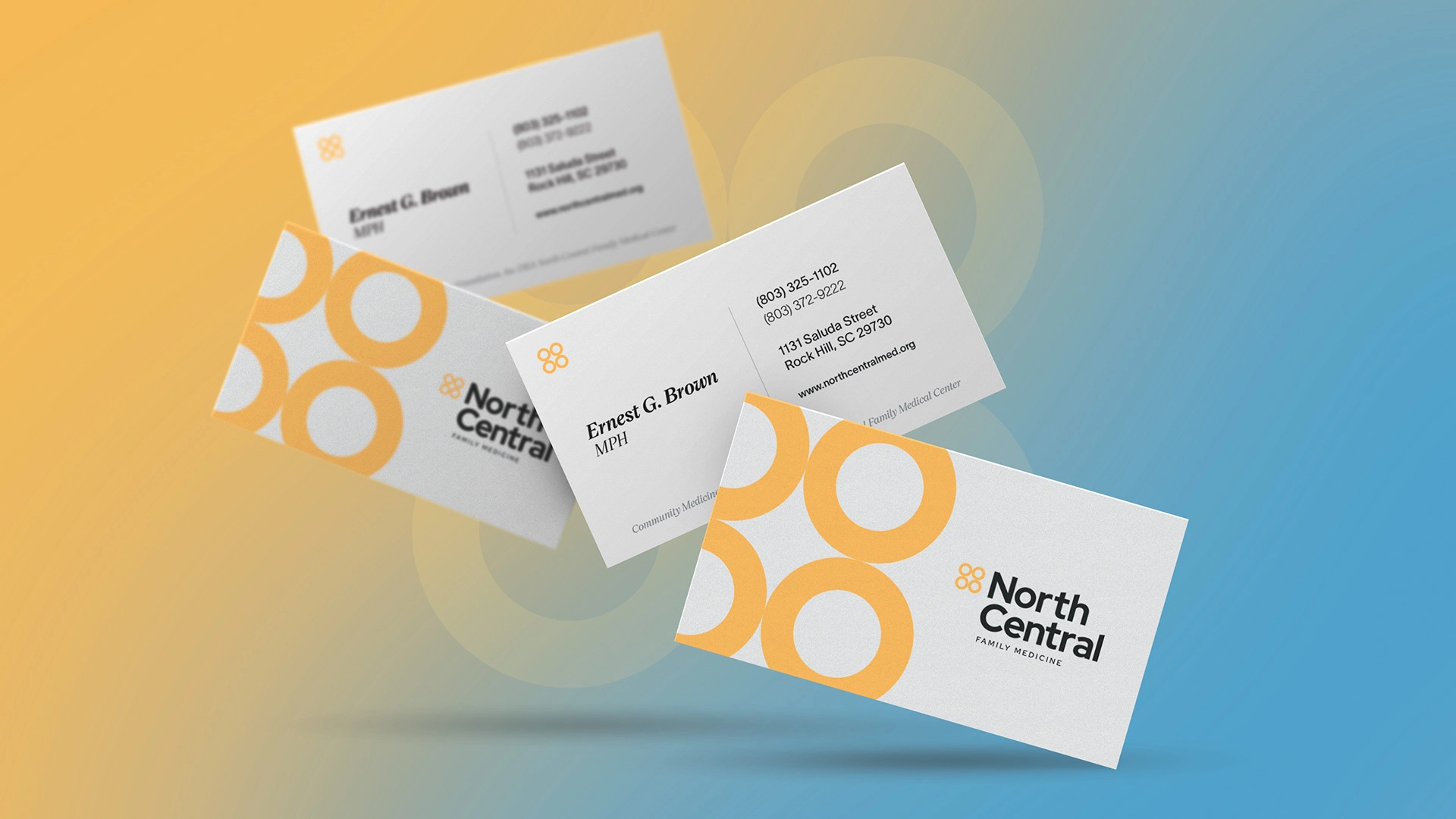 Business cards featuring North Central's branding